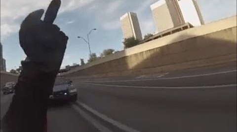 Guy On A Motorbike Sticks His Middle Finger Up At Cops